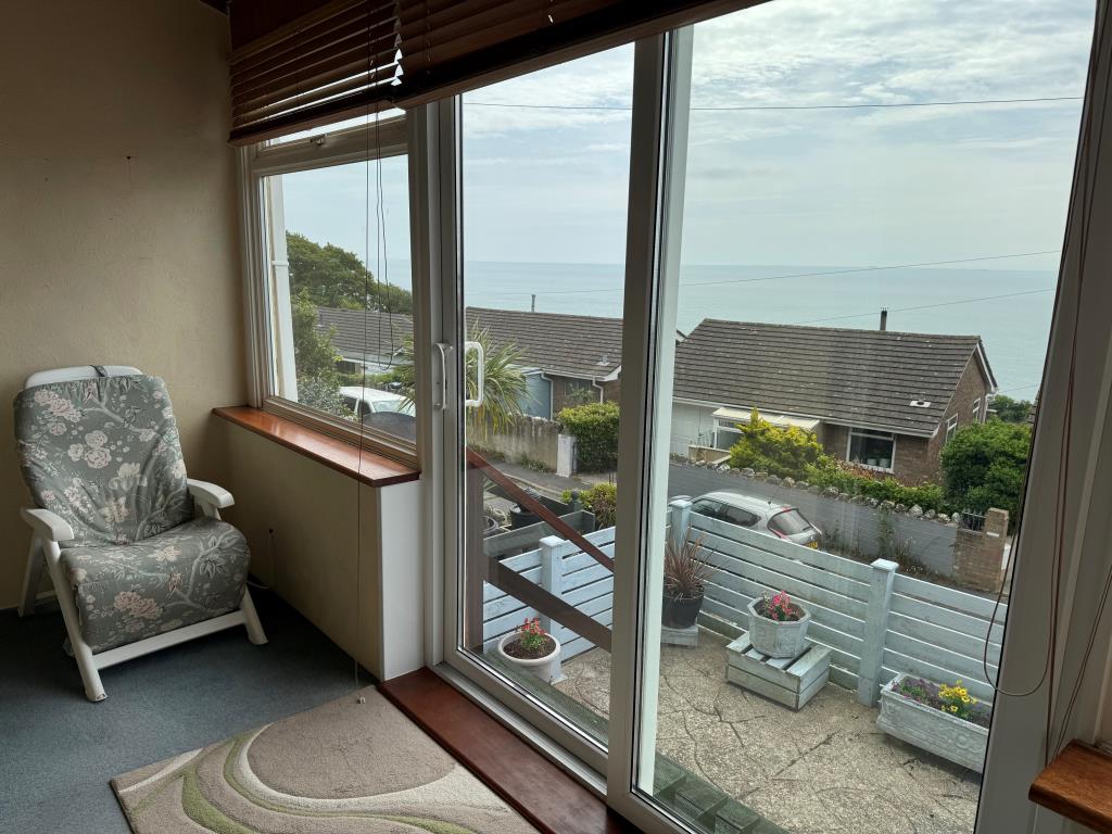Lot: 101 - SEMI-DETACHED HOUSE FOR IMPROVEMENT WITH SEA VIEWS - The View from the Sunlounge